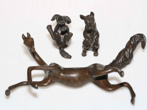 Collection of three signed bronze animals including horse and two dogs.