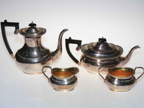Silver four piece tea and coffee service, having gadroon rims, London...
