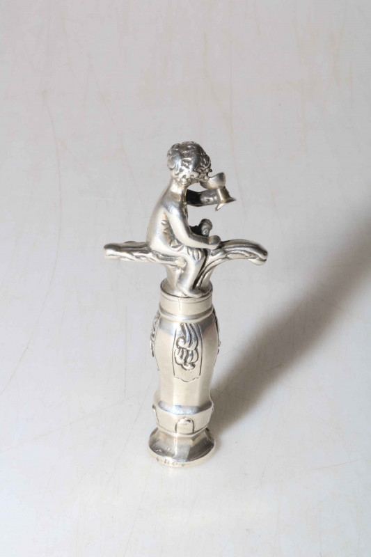 Dutch silver cherub corkscrew, 8.5cm length.