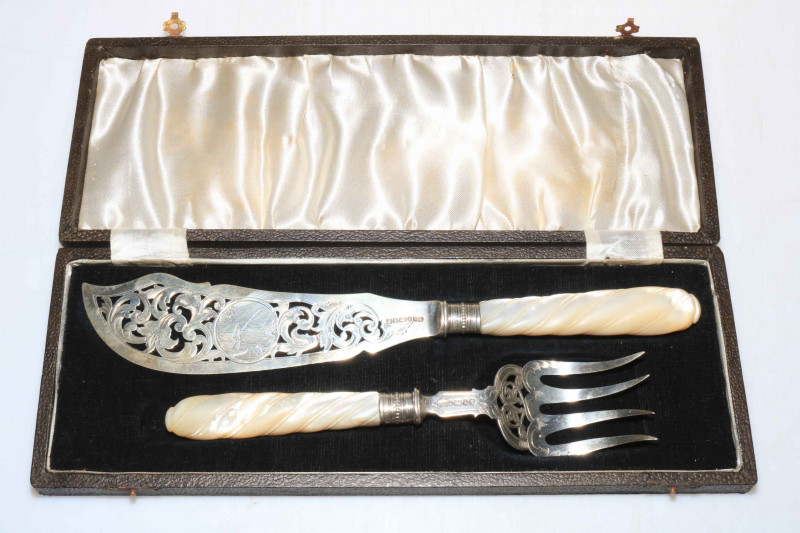 Good Victorian silver and mother of pearl fish servers, with engraved decoration including fishermen scene, Sheffield 1866, cased.