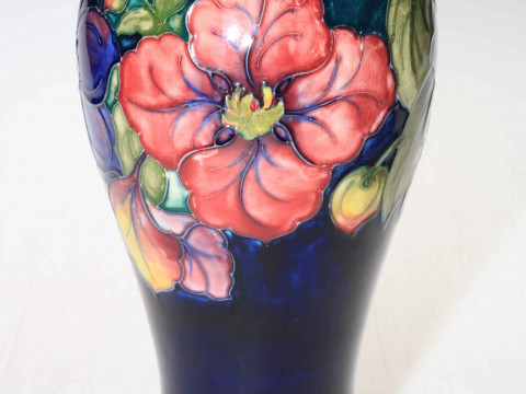 Moorcroft baluster vase decorated with clematis on green ground, 27cm...