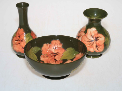 Moorcroft bowl, 8cm, vase, 14cm, and stemmed vase, 16cm, decorated with...