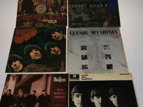 Six Beatles LP's including St. Peppers, Rubber Soul, etc.