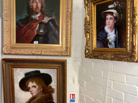 Three framed portrait oils.