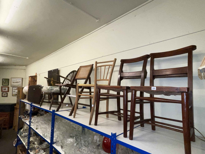 Pair rush seated chapel chairs, Ercol Fleur De Lys back armchair, rectangular Ercol coffee table, cane panelled folding chair, beech side chair, Bubbles print and French pine baguette holder (8).