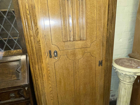 Linen fold panel oak hall wardrobe.