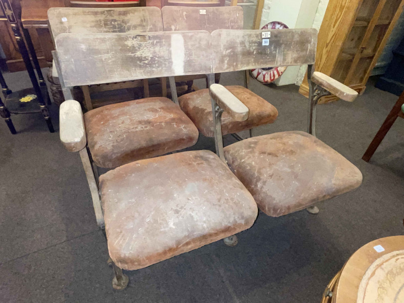 Pair vintage cast base banks of two folding cinema seats, 83cm by 108cm.