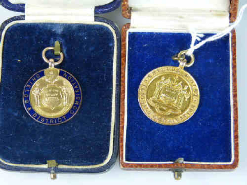 Two 9ct Gold Shields & District Football Medals