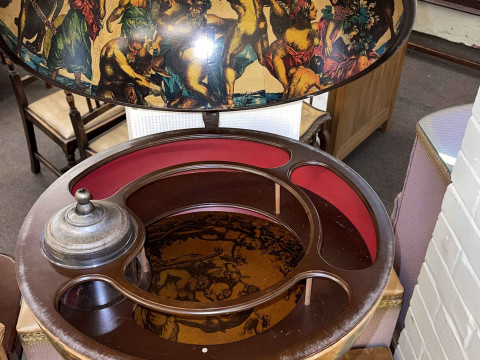 Revolving Latin globe cocktail cabinet on pedestal stand. thumbnail
