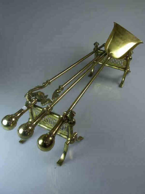 Pair of Brass Fire Andirons and Three Brass Fire Irons