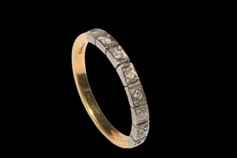 18 carat gold eight stone diamond half eternity ring.