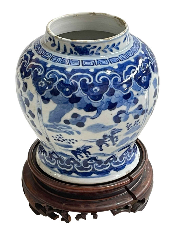 Chinese porcelain blue and white vase on wood stand decorated with horses and riders in landscape, Kangxi mark, 15cm.