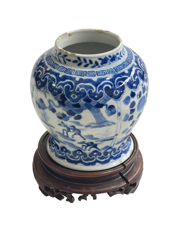 Chinese porcelain blue and white vase on wood stand decorated with horses and riders in landscape, Kangxi mark, 15cm.