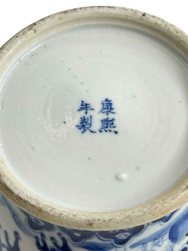 Chinese porcelain blue and white vase on wood stand decorated with horses and riders in landscape, Kangxi mark, 15cm.