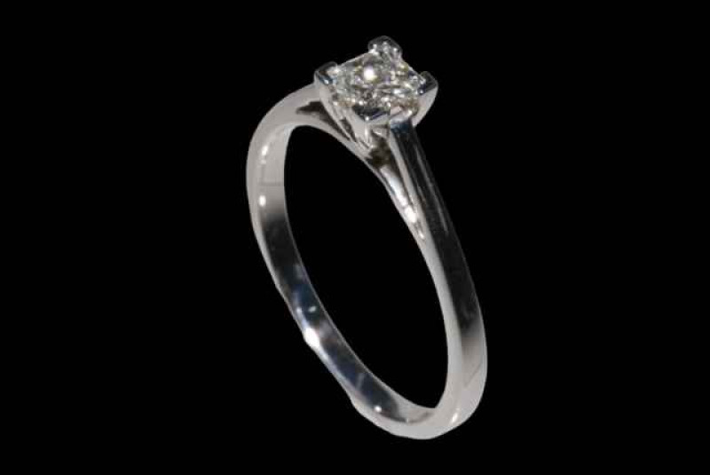 18 carat white gold princess cut solitaire diamond ring, diamonds approx 0.35 carats with certificate, size M.