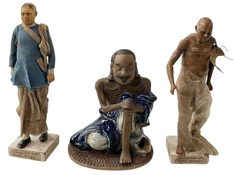 Three antique Indian pottery figures, Watercarrier, Bengali Gentleman (both approx 22cm) and Crouching Male.