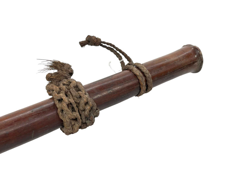Fijian Sali/Gata war club with bark carving to head and having string bands, 95cm length.