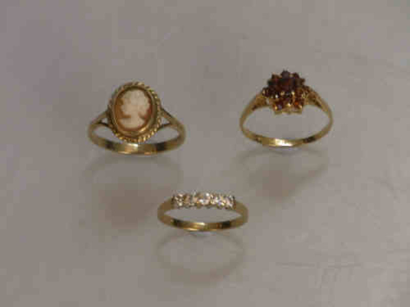 Three 9ct Gold Rings, Garnet, Cameo and White stones