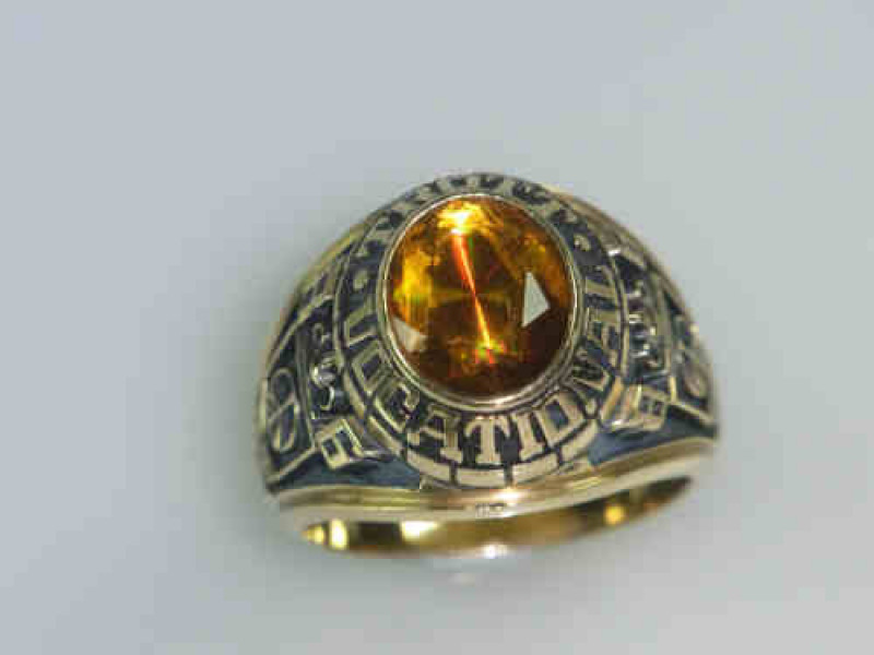 10ct Gold U.S.A. College Ring 'Trott Vocational', Set with a Faceted Yellow Stone, Size W, 17 Grams