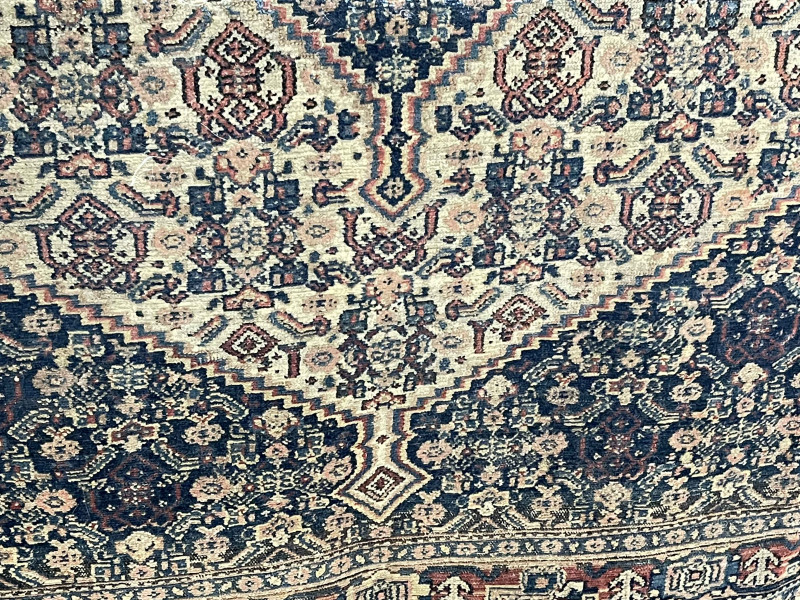 Antique Persian design rug 1.50 by 1.06.