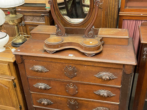 Victorian four drawer chest, oak hall wardrobe, two 19th Century toilet mirrors, Victorian oval inlaid walnut loo table, set of six Victorian mahogany bar back dining chairs, rug, five various lamps, Victorian glass oil lamp base, brass trivet and Adderley's bone china table service. thumbnail