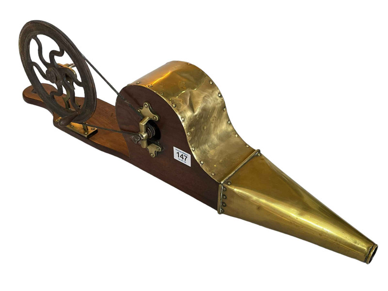 Brass and wood bellows.
