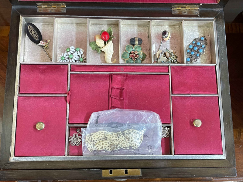 Mahogany and brass writing slope and a sewing box housing costume jewellery.
