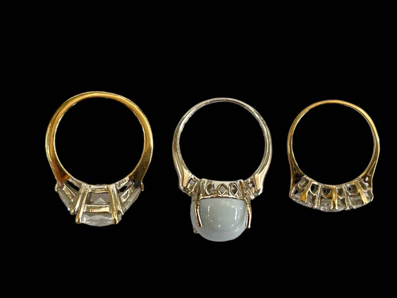 Three 9 carat gold gem stone rings.
