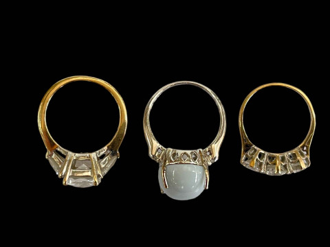 Three 9 carat gold gem stone rings. thumbnail