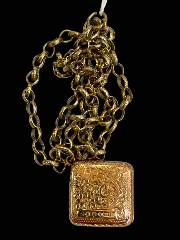 9 carat gold engraved locket with chain necklace.