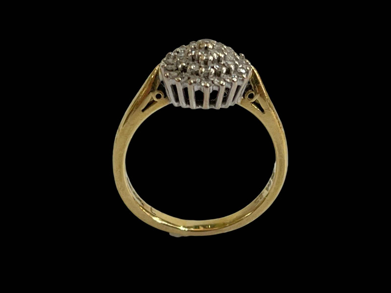 Diamond cluster 18 carat gold ring, size N.