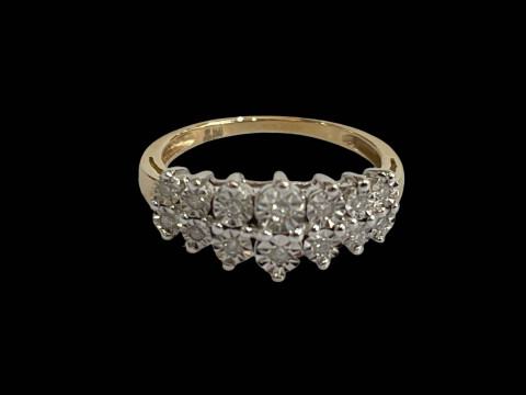 Diamond fourteen stone 9 carat gold ring, size N.