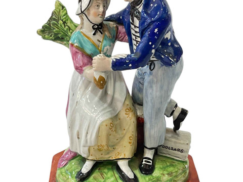 Antique Staffordshire figure group 'Return', 22cm.
