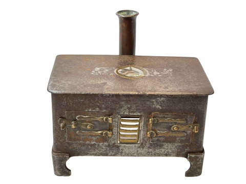 Miniature range with brass and copper fittings, 15cm across.
