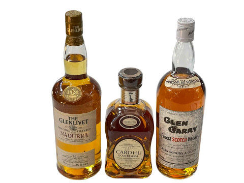 Three bottles of whisky; Cardhu Gold Reserve, Glenlivet Nadura 16 year...