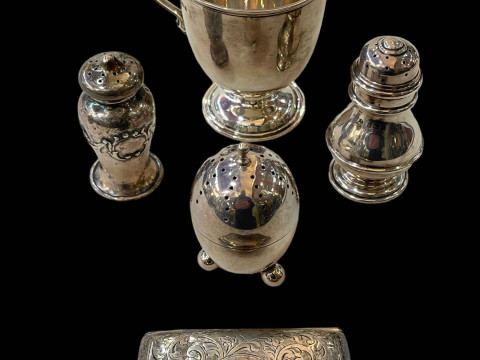 Silver pieces comprising: christening mug, cigarette case, and three pepperettes...