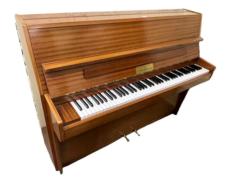 1980's John Broadwood & Sons mahogany upright overstrung piano, 109cm by 142cm by 22cm.