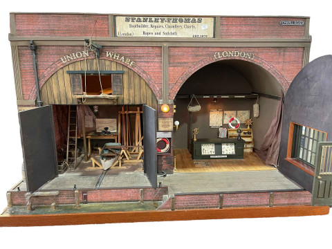 Steve Hilbert, miniature model of a boathouse, with electric lights. thumbnail