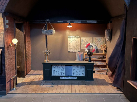 Steve Hilbert, miniature model of a boathouse, with electric lights. thumbnail