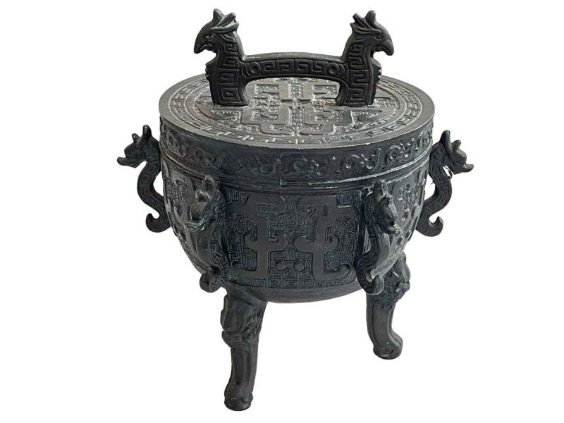 Oriental style three legged metal vessel with lid.