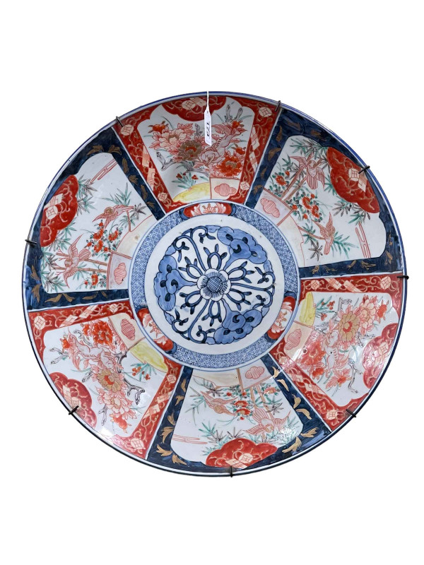 Large Imari charger decorated with birds and floral scenes, 48cm.