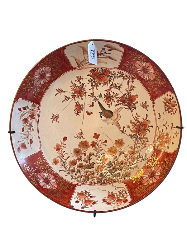 Japanese charger decorated with bird in floral landscape, 36cm diameter.