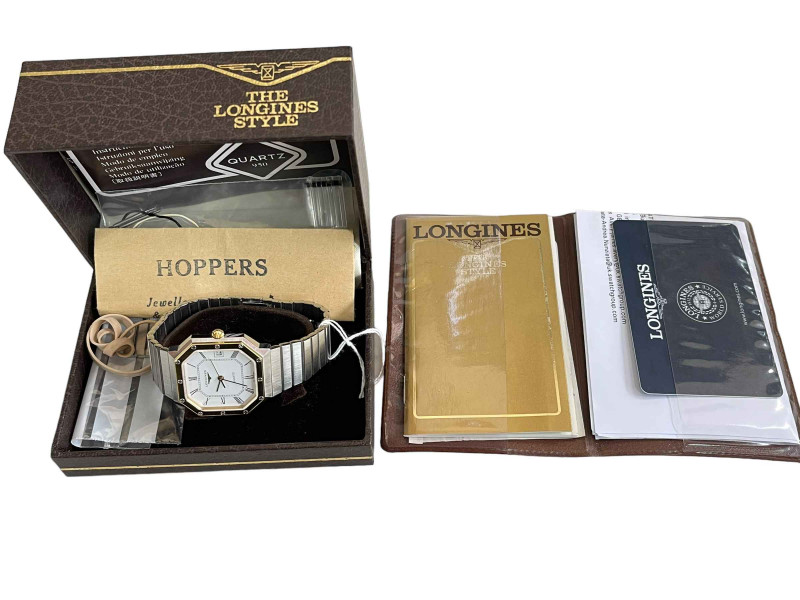 Longines gents octagonal bracelet date watch with service records and box.
