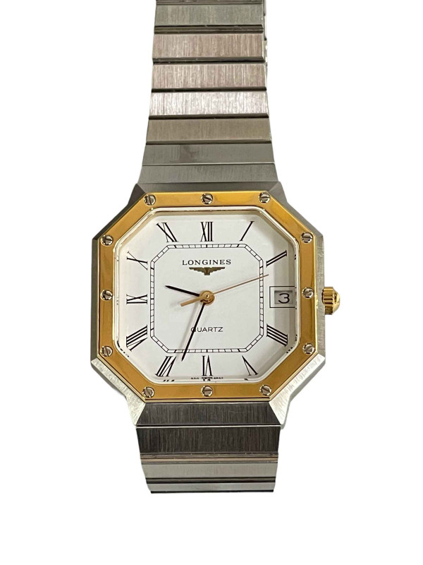 Longines gents octagonal bracelet date watch with service records and box.