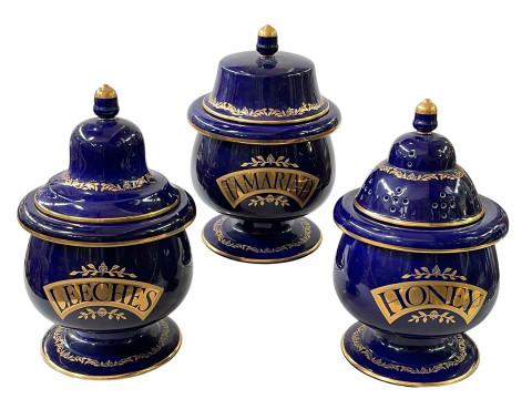 Three replica pharmaceutical storage jars, tallest 38cm.