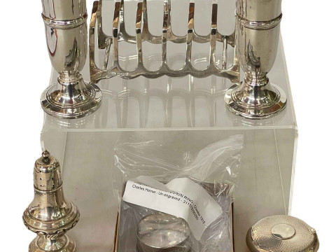 Silver pieces comprising George Unite engine turned box, seven bar toast...