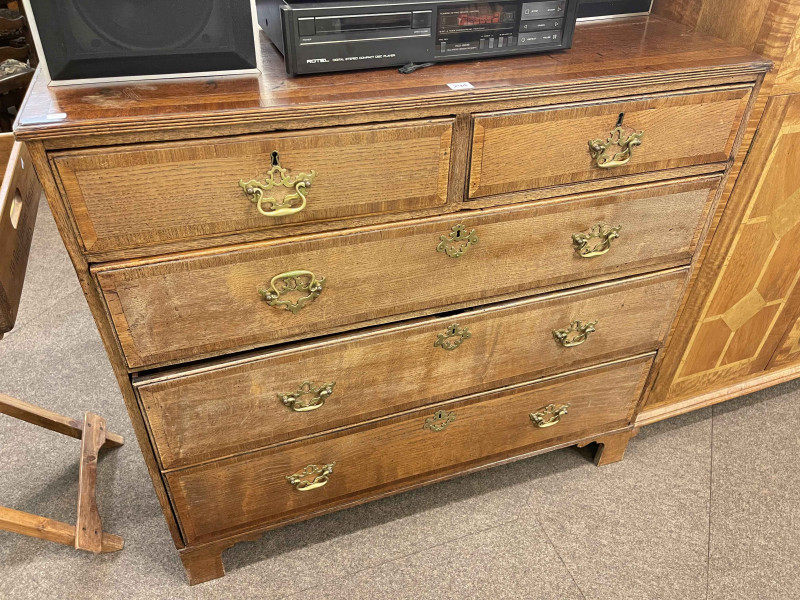 19th Century oak and mahogany chest of two short above three long graduated drawers on bracket feet, 98cm by 105cm by 50cm.