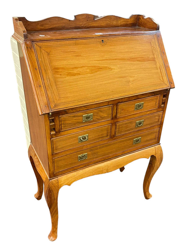 Hardwood and brass inlaid five drawer bureau on cabriole legs, 110cm by 69cm by 34cm.