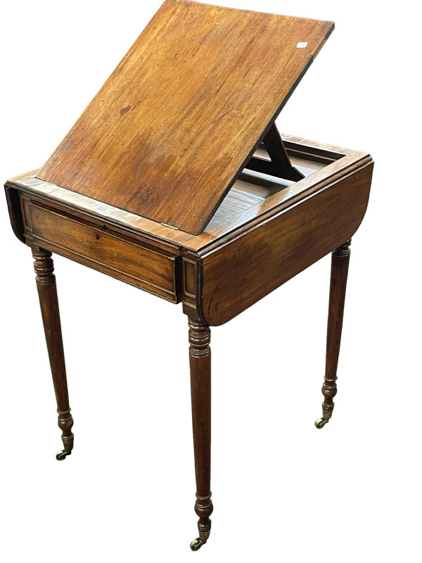 19th Century mahogany architects table having adjustable easel top above a frieze drawer on ring turned legs, 75.5cm by 52.5cm by 59cm (easel and leaves down).