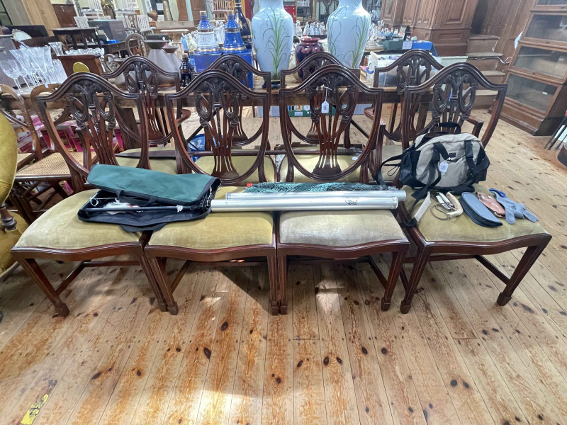 Set of eight mahogany Hepplewhite style shield back dining chairs including pair carvers.